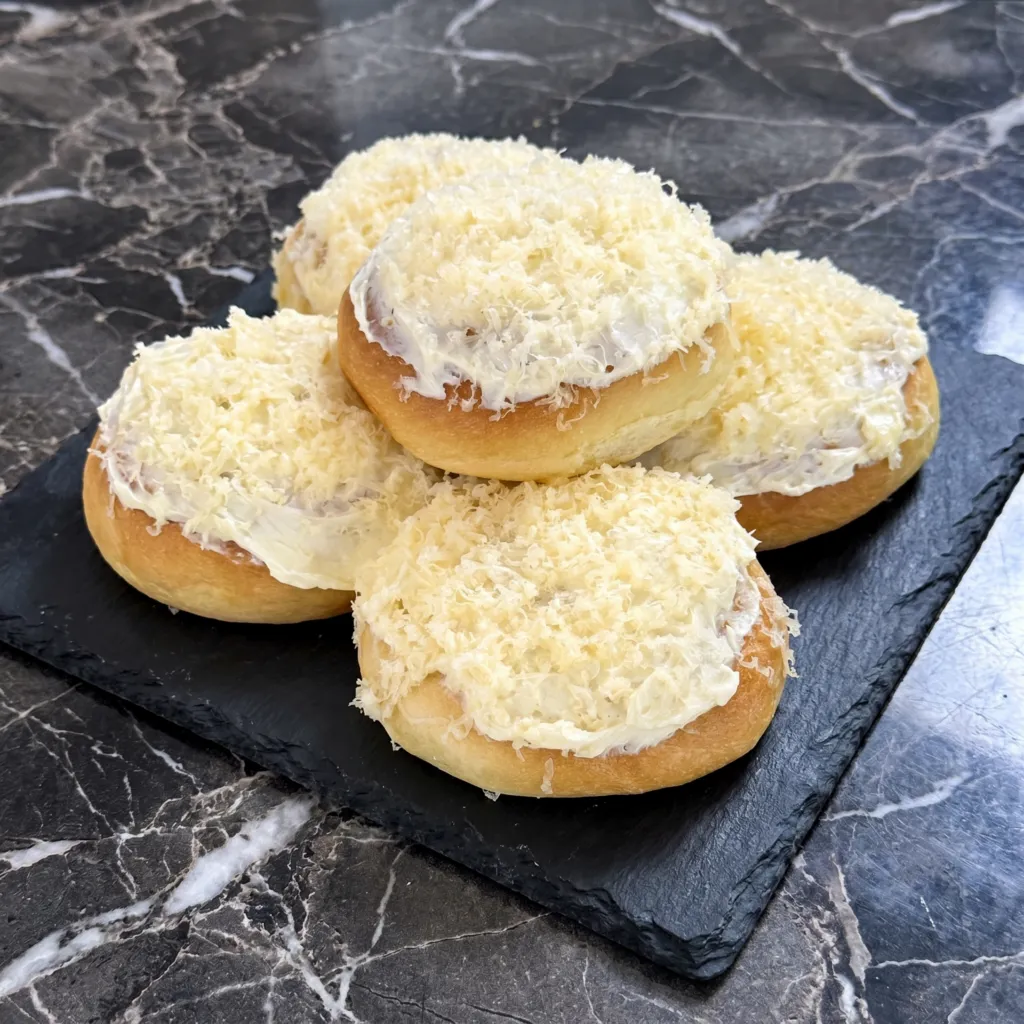 Cheese Ensaymada (The Fluffiest, Cheesiest Filipino Brioche You’ll Ever Meet)